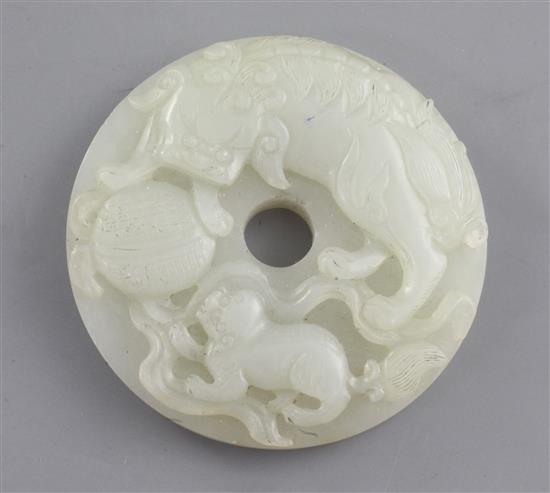 A Chinese pale celadon bi disc, 19th century, diameter 5.1cm